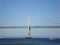 Boat passes under the San Francisco side of Bay Bridge