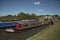 Boat passing through a lock on an English canal UK