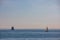 A boat passing New London Ledge Lighthouse in Groton, Connecticut on the Thames River