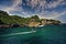 Boat passing Rock Cliff at Gesing Fishing village Port Jogjakarta