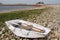 Boat on pebble beach