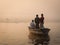 Boat with Pilgrims Approaching the East Bank of the Ganges River