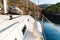 Boat in a quiet bay of Smrka on Brac island, Croatia. Morning in Croatian bay. Holiday on a yacht. Yachting sport. Yacht deck