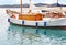 Boat reflection on sea at Porto Heli Argolis Greece