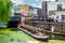 Boat on the Regent's Canal in Camden Town with a view of Camden Market