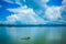 A boat resting in the middle of a lake