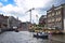 Boat Ride on Amsterdam Canal with ongoing construction in the background