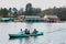 Boat riding a family at the kodaikanal lake near the boat house.