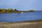 Boat on the river with a barge