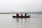 Boat on the river Ganges with several passengers