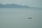 A Boat Running in the Nam Ngum Reservoir in Vientiane Province, Laos.