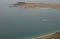 Boat sailing between El Risco beach and La Graciosa.