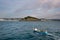 Boat and Santa clara island in San Sebastian city coastline