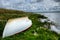 A boat sits by a Loch in Orkney