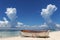 a boat sitting on top of a sandy beach on bantayan island in the Philippines