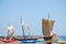 Boat souvenirs against the background of the ocean in Sri Lanka, souvenirs