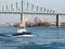 Boat on St-Lawrence river with the Jacques-Cartier bridge in background. Winter time