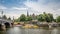 Boat station and street cafe in old part of Stockholm near Nordic Museum, view from the river, Sweden