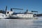 Boat stuck solid in the ice in winter