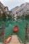 Boat tethered on stairway at Lake Braies boathouse