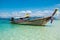 Boat Thai in The beautiful miracle beach & crystal clear water a