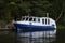 A boat tied to a deck in lake