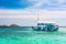 A Boat Tourist on Blue and Turquoise Clear Water