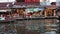 A boat with tourist in a water canal, Khlong Lat Mayom Floating Market