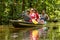 Boat With Tourists In Amazonian Jungle