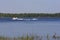 Boat Tows Waterskier on Bass Lake  703471