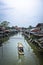 Boat and traditional canal village in Thailand