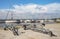 Boat trailers at a marina on a sunny day