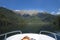Boat trip on a mountain lake on a warm summer sunny day