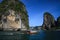 Boat Trip to  islands along steep cliffs in blue Andaman Sea near Ao Nang, Krabi, Thailand