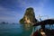 Boat Trip to  islands along steep cliffs in blue Andaman Sea near Ao Nang, Krabi, Thailand