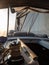 Boat trip on a yacht under sail, a fragment of the deck and the mountains on the horizon, the view from the deck.