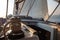 Boat trip on a yacht under sail, a fragment of the deck and the mountains on the horizon, the view from the deck.