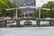 Boat under bridge on canal in Amsterdam