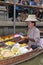 Boat vendor preparing mango sticky rice at floating market around Bangkok area