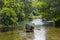 Boat on the very clear river Black Drin