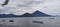 A boat and view of Maitara and Tidore island, North Maluku.