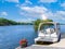 A boat waiting for a ride on a lake near Georgian Bay and Blue Mountain resort in Muskoka, Ontario