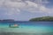 Boat at the white sand beaches in the kingdom of Tonga