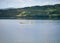 Boat with yellow buoy in a lake