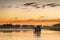 Boat on Yellow Water billabong at dawn, Northern Territories, Au