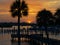 Boaters enjoy a lazy sunset as they cruise the Anclote River. Tarpon Springs, Florida Sunset