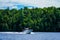 Boaters enjoy summer day on Lake Placid in New York State`s Adirondack Mountains