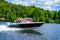 Boaters enjoy summer day on Lake Placid in New York State`s Adirondack Mountains