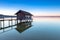 Boathouse at lake Ammersee at dawn