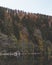 Boathouse at lake in autumn forest at lac longemer-xanrupt in Vosges, France